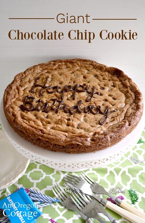 A giant cookie is an easy way to a birthday cake everyone will love. This recipe shows how to make it with chocolate chips and baked in a pan or a cast iron skillet, but you can add other candies too. Our kids loved this fun birthday tradition! #cookie #birthday #chocolatechips Cookie In A Skillet, Birthday Potluck, Easy Cookie Cake, Chocolate Chip Cookie Cake Recipe, Oregon Cottage, Cottage Recipes, Chocolate Chip Cookie Cups, Cookie Birthday, Simple Cookie