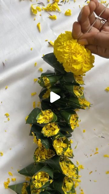 Harika Reddy on Instagram: "Day 22 of 60 Festive DIYs Magic With Harika 🪷

Toran/ Toranam for festivals using mango leaves and marigolds ✨🪔🌼

Save and share this idea with someone whom you find useful🤝

#repost

| DIY series, DIY, crafts, festive decor, Ganesh Chaturthi decor, Ganesh Chaturthi decor ideas, ugadi decor, toranam for festivals, Diwali, Diwali decor, Diwali 2023, home decor, Indian festival, toran, mango leaf toran, mango leaves, toranam, festive toran, festive toranam, festive hangings, flower hangings, marigold crafts, mango leaves crafts, eco-friendly, sustainable, sustainable living |" Diwali Home Decor With Flowers, Traditional Diwali Decor, Toran With Flowers, Home Flower Decoration Indian, Diwali Decoration With Leaves, Dipawali Decoration Craft, Mango Leaves Decoration Ideas, Flower Diwali Decoration, Simple Diwali Decorations At Home Diy