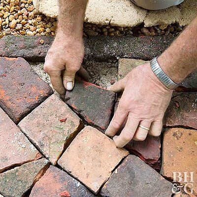 101267800 Old Brick Patio, Diy Brick Patio, Arreglos Ikebana, Brick Pathway, Brick Projects, Brick Patio, Brick Path, Patio Flowers, Brick Walkway