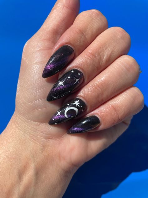 Halloween Moon And Stars Nails, Triple Moon Goddess Nails, Purple Sun And Moon Nails, Black Nails With Crescent Moon, Purple Moon And Star Nails, Purple Tiger Eye Nails, Cat Eye Nails With Stars, Witchy Nails Almond Short, Cat Eye Moon Nails