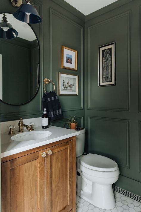 | Curio Design Studio Dark Green Bathroom White Tiles, Half Bath Color Drench, Half Green Wall Bathroom, Hunter Green Accent Wall Bathroom, Forest Green Powder Room, Chairrail Wainscoting Bathroom, Benjamin Moore Salamander Bathroom, Small Bathroom Blue Walls, Small Bathroom Moody