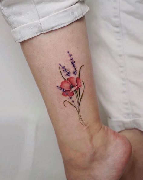 17 Remarkable Poppy Flower Tattoo Designs - Mom's Got the Stuff Poppy Flower Moon Tattoo, Field Of Poppies Tattoo, Tattoos With Names And Flowers, Poppy Wrist Tattoos For Women, Wildflower Poppy Tattoo, Larkspur And Poppy Flower Tattoo, Small Poppy Tattoos, Dragonfly And Poppy Tattoo, Poppy Arm Tattoos For Women