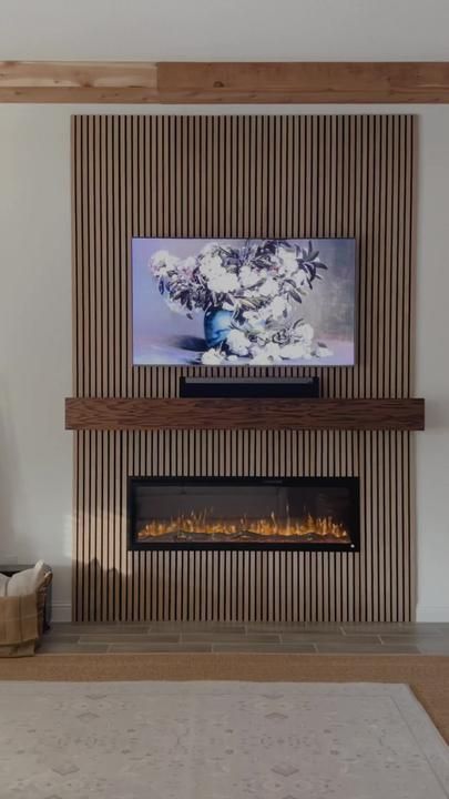 Modern Electric Fireplace Living Room, Wood Panel Electric Fireplace Wall, Slat Wall High Ceiling, Wall Slat Fireplace, Electric Fireplace On Flat Wall, Fireplace Tv Wall Small Living Room, Wood Slat Accent Wall Tv, Fluted Wood Fireplace Wall, Slat Wall With Fireplace