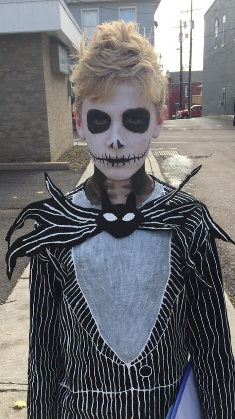 Jack Skellington.  Black T-shirt and Black pants, with painted white stripes (puff paint). Jack The Skeleton Face Paint, Jack Skeleton Face Paint, Jack Skellington Face Paint For Kids, Jack Skellington Makeup For Guys, Skellington Face Paint, Jack Skellington Face Paint, Skeleton Makeup Kids, Jack Skellington Makeup, Skeleton Face Paint