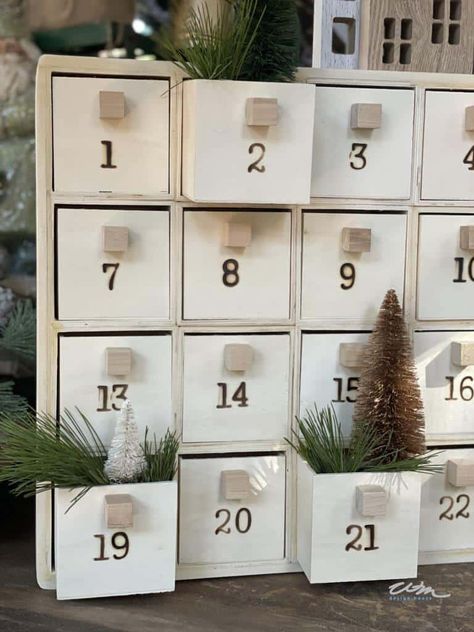 Easy and fun DIY Advent Calendar boxes: Christmas in July Dollar Tree Wooden Box Advent Calendar, Diy Dollar Tree Advent Calendar, Wooden House Advent Calendar, Wood Advent Calendar, Homemade Advent Calendars, Advent Calendar Boxes, Wooden Box Diy, Advent Box, Chocolate Advent Calendar