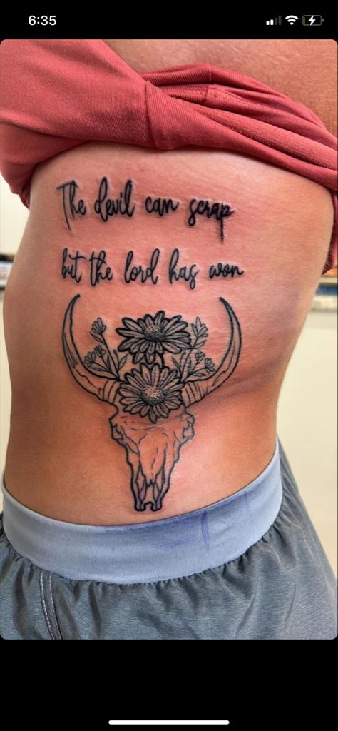 Wrangler Tattoos For Women, Women Rib Cage Tattoo, The Devil Can Scrap Tattoo, Country Lyric Tattoos For Women, Western Tattoos For Women Thigh, Small Southern Tattoos, Sun To Me Tattoo Zach Bryan, Country Girl Tattoos For Women, The Devil Can Scrap But The Lord Has Won