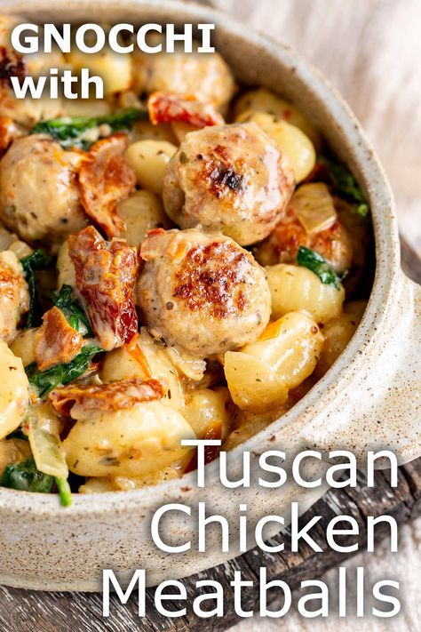 This Tuscan Chicken Meatballs with Gnocchi is a cozy and hearty recipe that can be made in the slow cooker or on the stovetop. Succulent chicken meatballs seasoned with Italian herbs, sun-dried tomatoes, and garlic, bathed in a rich Tuscan-inspired creamy sauce, all mingling with pillowy-soft gnocchi. It's the kind of dish that makes you want to throw on your favorite sweater, grab a bowl, and curl up on the couch. This chicken meatball recipe is easy to make and uses easy-to-find ingredients. Healthy Elizabeth, Chicken Meatball Recipe, Ground Chicken Meatballs, Slow Cooker Pasta Recipes, Meatball Dinner, Chicken Meatball, Chicken Meatball Recipes, Chicken Gnocchi, Sides Recipes