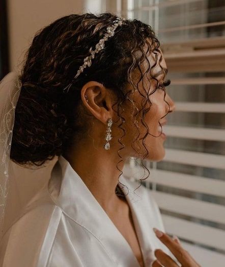 Bun With Crown Brideâs Wedding Hairstyle For Naturally Curly Hair Bridal Buns Hairstyle, Bridal Hairstyle For Curly Hair, Curly Hair With Veil Weddings, Curly Bridal Hairstyles With Veil, Curly Hair Veil Brides, Curly Wedding Hairstyles With Veil, Veil With Bun, Curly Hairstyles Bride, Curly Hair Veil