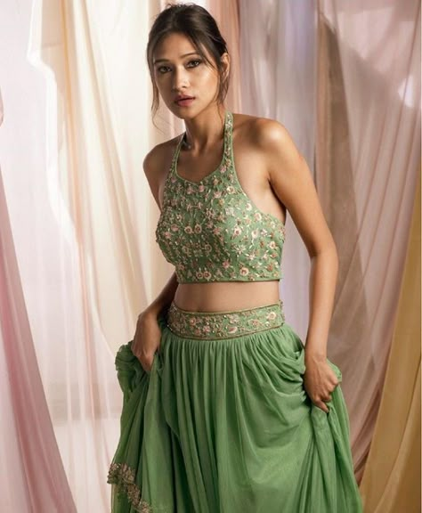 Beautiful Lehenga-Choli with superb embellishments. Sleeveless Crop Top Lehenga, Sleeveless Lehenga, Gorgeous Lehenga, Lehenga Green, Elegant Lehenga, Stylish Lehenga, Sleeveless Blouse Designs, Beautiful Lehenga, Saree Blouse Styles