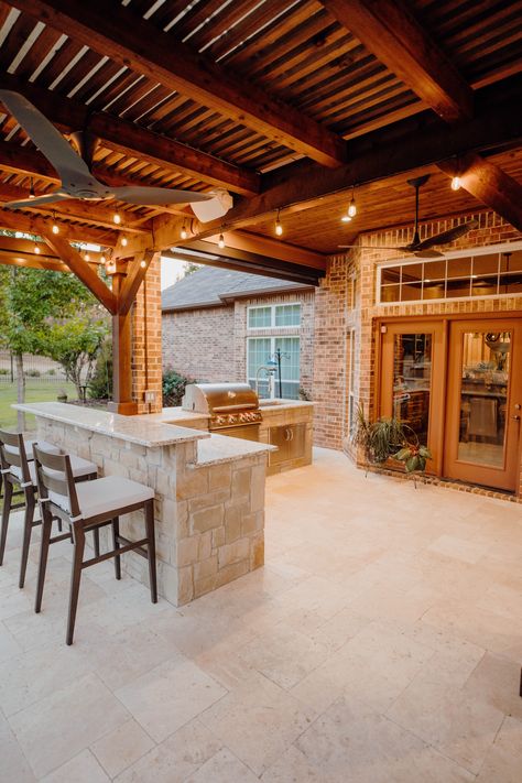 One of our latest project in Weatherford features a gorgeous cedar pergola, an elegant outdoor fireplace, and fans to keep your outdoor living area comfortable year-round. This space is designed to blend seamlessly with your home's architecture while adding functional elegance. #Design #CedarPergola Backyard Gazebo With Fireplace, Outdoor Kitchen Under Pergola, Outdoor Fireplace With Tv, Patio Pavilion, Outdoor Hosting, Cedar Pergola, Yard House, Double Sided Fireplace, Outdoor Pavilion