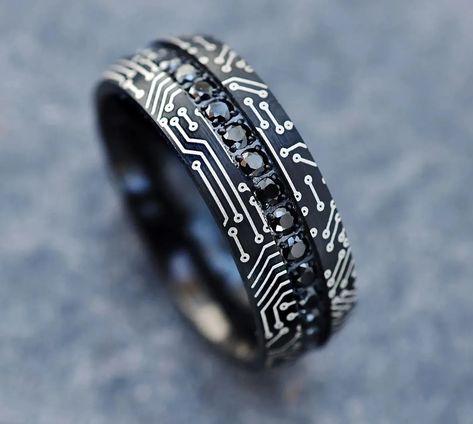 We've crafted the ultimate list of the best wedding bands we can find. From classic yellow gold to wood and tungsten styles, we've covered all the bases. Take a peek at our favorite wedding rings and styles for men! Geek Wedding Rings, Cool Mens Wedding Bands, Mens Wedding Rings Black, Mens Wedding Rings Tungsten, Computer Circuit, Cool Rings For Men, Victorian Pattern, Mens Gold Wedding Band, Mens Wedding Bands Tungsten