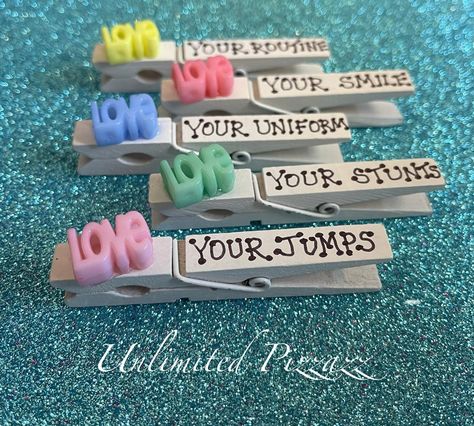 Unlimited Pizzazz offers fun and affordable cheer pins / spirit clips for your cheerleading season.  These pins are made with quality, wooden clothes pins and hand-decorated with fun and unique embellishments.  Affordable so that everyone can share their spirit and good luck wishes around the world!   These clips are custom, hand-made and sometimes, hand-written so slight imperfections should be accepted.  We use quality embellishments to provide the best quality possible. BUY THEM - SHARE THEM - COLLECT THEM ALL!  Cheer pins / Spirit Clips are a fun and fabulous way to spread good sportsmanship at your next competition! This item includes 5 customized clips as pictured above.  Will ship within 2 business days of payment via USPS.   Need more?  Want custom clips for your team?  Contact us! Hit Zero Cheer Pins, Cheer Pins Sayings, Spirit Pins Cheer, Cheer Clip Ideas, Cheer Close Pin Ideas, Cheer Incentives, Spirit Sticks Cheerleading Diy, Good Luck Cheer Clothes Pins, Cheer Pegs