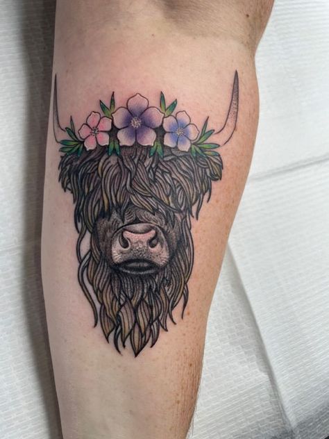 Step into the farmyard of fashion with cow tattoo designs! We've rounded up over 70 cow tattoo ideas that are just udderly irresistible. Hyland Cow Tattoo, Highlander Tattoo, Highland Cow Tattoo With Flowers, Cow Tattoos For Women, Cow Tattoo With Flowers, Cow Tattoo Ideas, Cow Tattoos, Highland Cow Tattoo, Female Cow