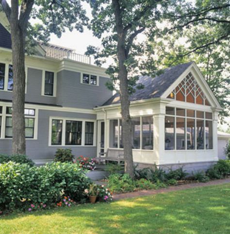 Sunrooms are popular because they support a casual lifestyle and add flexible living space. See how to use sunrooms to add four-season living space while complementing the exterior of your home. http://www.bhg.com/home-improvement/porch/sun-room/sunrooms-ideas-seamless-exterior-additions?page=2 Sunrooms Ideas, Screened Porch Designs, Four Seasons Room, Sunroom Addition, Three Season Room, House Redo, Porch Addition, Sunroom Decorating, Building A Porch