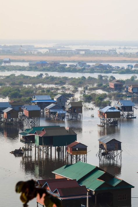 The largest freshwater lake in South East Asia, Tonlé Sap is of great importance to Cambodia. It changes size with the seasons, increasing in size, from 2,500 square kilometres to 12,500 square kilometres, during the monsoon. Tonlé Sap is home to many ethnic Vietnamese and numerous Cham communities who live in floating villages. From glorious temples and rich heritage to rare wildlife, tropical beaches, and great eco-tourism spots, here are 11 of the best things to see in Cambodia. Countryside Village, Tonle Sap, Eco Tourism, Cambodia Travel, Tropical Beaches, South East Asia, East Asia, Architecture Building, Southeast Asia