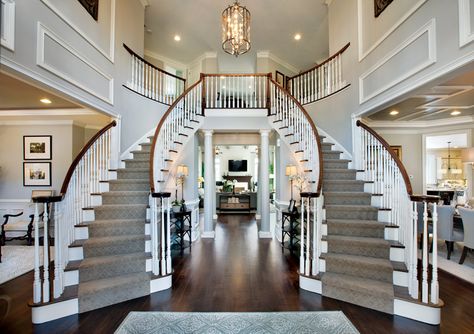 DOUBLE STAIRS FOYER | Dramatic Two-story foyer with elegant curved staircases Foyer Staircase, Double Staircase, Foyer Decorating, Coastal Living Rooms, Foyer Design, Curved Staircase, Grand Staircase, Story House, House Goals