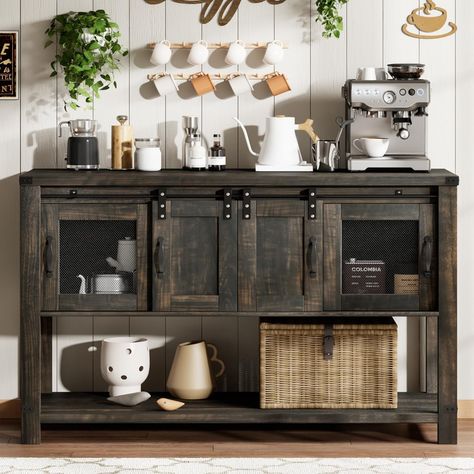 PRICES MAY VARY. Farmhouse & Vintage Coffee Bar Cabinet: This farmhouse coffee bar cabinet blends industrial and modern farmhouse styles. The distressed oak finish provides a naturally aged feel, creating a cozy and retro vibe, making it a classic piece for your home. Ample Storage Space: This coffee bar table features 2 single-door cabinets on the sides, 2 sliding barn doors in the middle, and a large open shelf at the bottom. These coffee bar provide ample open and closed space to display and organize your kitchen items. Multi-Usage Coffee Bar: This coffee station with doors and shelves offers versatile functionality. In the dining room, it serves as a coffee bar. In the kitchen, it functions as a buffet sideboard. It can also be used as a TV stand in the living room, adding comfort to y Farmhouse Buffet Cabinet, Coffee Bar Table, Farmhouse Storage Cabinets, Coffee Bar Cabinet, Mesh Doors, Farmhouse Buffet, Vintage Console Table, Cabinet With Storage, Farmhouse Coffee Bar