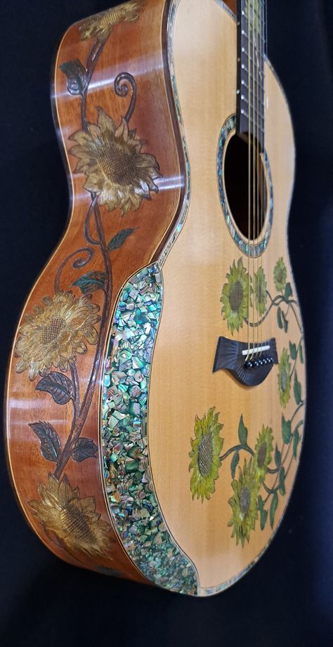 Blueberry NEW IN STOCK  Handmade Acoustic Guitar Grand Concert  - Yellow Flowers Watch and listen to a Blueberry Grand Concert Guitar in Action https://youtu.be/D_A5TUK-djE Blueberry Handmade Acoustic Guitars are made on the tropical island of Bali by our experienced team of traditional wood carvers and artisans who have been practicing their craft for generations.   Our unique workshop has been creating singular objects of musical and visual beauty since 2005.   This is your opportunity to own Acoustic Guitars Designs, Beautiful Guitars Acoustic, Aesthetic Acoustic Guitar, Art On Guitar, Cool Acoustic Guitars, Painted Guitar Acoustic, Painted Acoustic Guitar, Vintage Acoustic Guitar, Painted Guitars