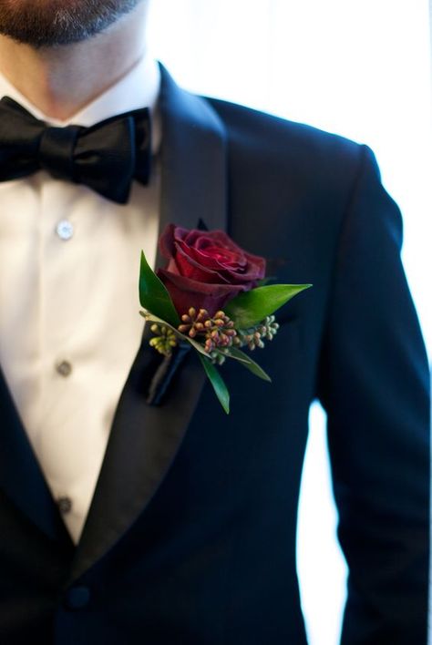 a burgundy rose boutonniere with leaves and berries is a bold touch to a classic black tux look Rose Boutineer, Red Rose Boutonniere, Red Boutonniere, Red Rose Wedding, Rose Boutonniere, Red Rose Flower, Corsage Wedding, Boutonniere Wedding, Pink Blossom