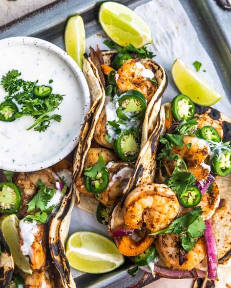 Cajun Shrimp Tacos with Garlic Lime Ranch - Britney Breaks Bread Cajun Shrimp Tacos, Cajun Seafood Boil, Breakfast Tacos Recipe, Pulled Pork Nachos, Pork Nachos, Cajun Seafood, Mango Salsa Recipes, Fried Beef, Cajun Shrimp