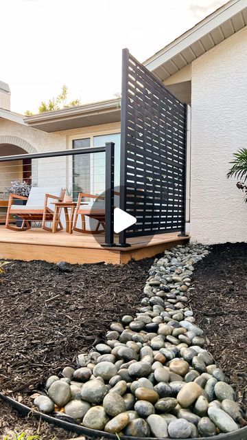 Jacki Quinones | DIY + Home Decor on Instagram: "Do you have proper downspout drainage? 💦

We did this outdoor project two years ago to redirect our downspouts away from the house and deck.

Dig a trench with a slight slope away from the house or deck.

Cover with a weed barrier and fill 2-3” with landscape pebbles.

Top with decorative rock of your choice. We used 3” river rock.

Follow @crazylifewithlittles for more simple and affordable outdoor DIY projects! 🫶🏼

#diyhomeprojects #diyhomeimprovement #downspoutdrainage #gardendesignideas #dryriverbed #diygarden #hardscaping" Rock Drainage Landscaping, Water Drainage Ideas Yards, Downspout Runoff Ideas, Rain Gutters Drainage Ideas, Downspout Drainage Ideas, Landscape Pebbles, Rock Drainage, Downspout Drainage, Gutter Drainage