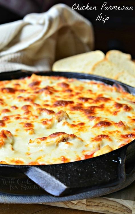 Chicken Parmesan Dip in a black skillet. The top is cheese that has been browned to perfection. Pieces of bread are in the background. Chicken Parmesan Dip, Parmesan Dip Recipe, Parmesan Dip, Will Cook For Smiles, Chicken Dip, Snack Dip, Buffalo Chicken Dip, Yummy Dips, Dip Recipe