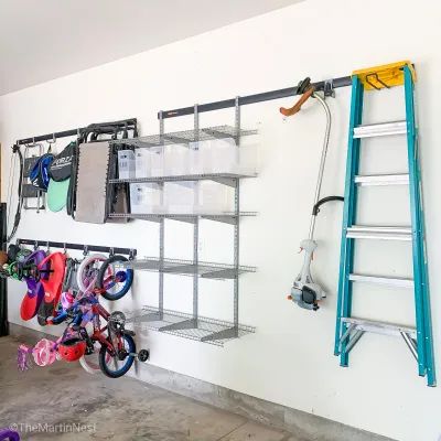 themartinnest.com - DIY. Organization. Lifestyle. Home Depot Garage Storage, Track Shelving, Wall Organization System, Garage Wall Shelving, Garage Wall Organizer, Garage Hacks, Garage Organization Systems, Garage Wall Storage, Garage Systems