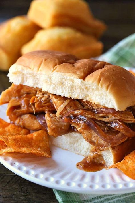 This easy Hawaiian Pulled Chicken comes out super tender and perfectly sweet & spicy! #slowcooker #recipes #easychickenrecipes #chickenrecipes #dinnerrecipes #crockpot Hawaiian Pulled Chicken, Pulled Bbq Chicken, Bbq Chicken Sliders, Princess Pinky Girl, Easy Slow Cooker Chicken, Super Easy Dinner, Pinky Girl, Picky Eaters Kids, Chicken Sliders