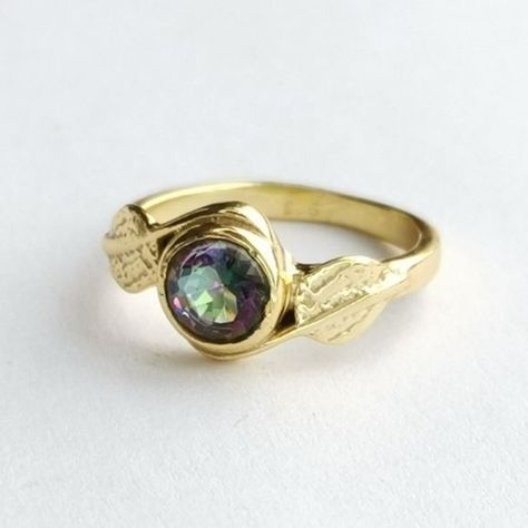 Mystic Topaz Fancy Round Cut Ring In Leaf Design In 14k Gold Fill Over Sterling Silver Stamped 925 Size 6 Mystic Topaz In This Ring Appears In Purple To Green Tones. Generally, The More Facets The Stone Has, The More Colours It Displays, And For That Reason The Fancy Cuts Are Often Used. Here The Topaz Is Round Cut, With Nice Reflections. I Have Attempted To Take Pictures From Several Angles To Best Display This Feature. Round Cut Ring, Big Stone Ring, Mystic Topaz Ring, Smoky Quartz Ring, Cz Rings Engagement, Turquoise Ring Silver, Rhinestone Ring, Silver Wedding Rings, Mystic Topaz