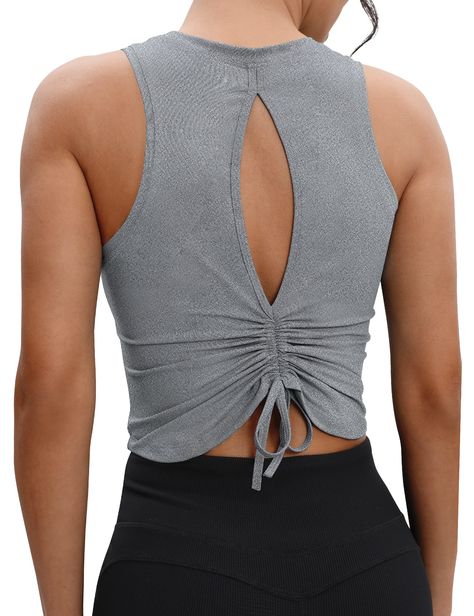 PRICES MAY VARY. 80% Polyester 20% Spandex Lightweight & Cooling Drawstring closure Cooling & Comfortable: VOOVEEYA athletic ruched crop tops for women is made with 4-way stretchy and sweat wicking lifestyle fabric,make it lightweight and breathable against your body. Pair with your favourite sports bra and biker shorts or high waisted leggings for your new go-to gym outfit or backless tops for women. Cut-Out Back & Ruched Drawstring : Flatter your curves with the ruched fitness tops for women w 2024 Workout Outfits Women, Gym Fashion Women, Gym Tops Women, Womens Athletic Outfits, Workout Clothing, Active Outfits, Gym Tops, Workout Aesthetic, Yoga Tops