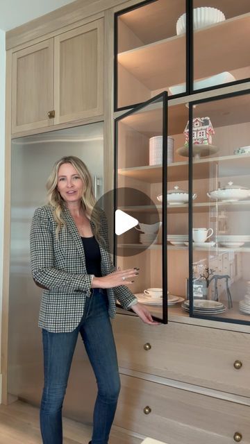 Kelly Griffiths on Instagram: "Save for later: iron glass display cabinets are a timeless addition to any kitchen design! Comment SHOP for links.  LED lighting and hidden hinges are the secret ingredients though and I’ve linked them.   Details: 1. The glass doors have black iron trim. 2. You simply push to open with a magnetic catch at the top. 3. The LED strips are located next to the door hinges and are recessed into the cabinets. They are on one of our kitchen switches. 4. The hinges are on the top and bottom of the doors and only as thick as the cabinet rail. 5. These cabinets are rift sawn white oak.  Follow along for more design details @the_english_modern  Shop this post on my LTK ⬇ https://liketk.it/4Y38w #ltkseasonal #ltkwatchnow #ltkhome  #kitchen #kitchendesign #interiordesignid Upper Glass Kitchen Cabinet Display, Glass Door Cabinet Kitchen, Tall Kitchen Cabinets With Glass Doors, Reeded Glass Upper Cabinets, Kitchen Ideas With Glass Cabinets, Kitchen Glass Cabinets Display Ideas Modern, Glass Wear Cabinet, White Oak Pantry Door, Black Glass Cabinets Kitchen