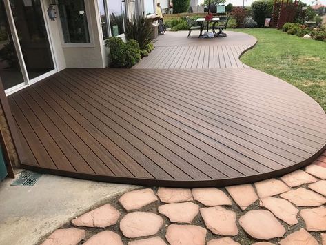 Trex Spiced Rum Curved deck. #DestinationTrexSweeps | Curved patio, Decks backyard, Patio design Trex Spiced Rum, Curved Deck, Curved Patio, Decking Ideas, Floating Deck, Patio Deck Designs, Wooden Deck, Star Decor, Deck Designs Backyard