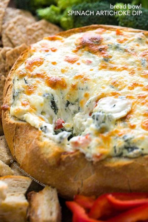 This rich and creamy Hot Spinach and Artichoke Dip recipe is easy, delicious and totally cheesy! Once mixed, this dip is baked until warm and melty in a bread bowl for the perfect football game appetizer. Artichoke Dip In Bread Bowl, Dip In Bread Bowl, Dip Appetizer Recipes, Hot Spinach And Artichoke Dip, Warm Spinach Dip, Warm Dip Recipes, Bread Bowl Dip, Hot Spinach Dip, Low Carb Low Calorie