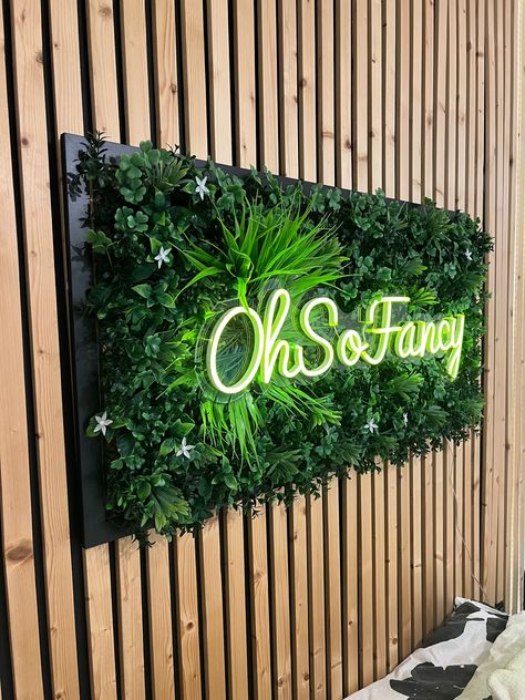 Have your own custom wording or logo backed by lush and beautiful tropical foliage🌴 All our signs are dimmable LED💡and presented in a wooden picture frame. Hooks on the back make this ready to hang in your bedroom, beauty space, living room, kitchen or anywhere you want to be OhSoFancy!😍 Mains operated and suitable for indoor use only. These signs are hand made in Cambridgeshire with great quality materials and allot of love.💖 🤔What's Next? Please ensure you provide your email address and a Grass Wall With Led Sign, Fake Plant Wall With Neon Sign, Grass Wall Bar Ideas, Neon Outdoor Sign, Green Wall With Led Sign, Green Accent Wall Salon, Logo On Wall Ideas, Moss Wall With Logo, Green Business Aesthetic