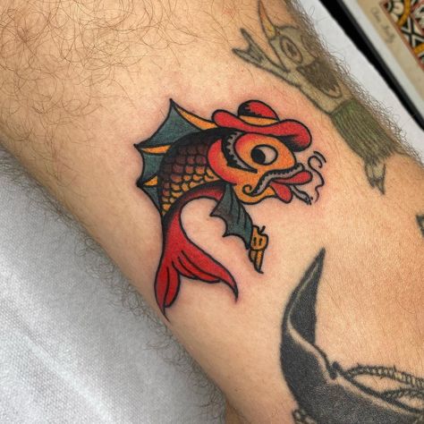 Super fun one for Kenneth! Thank you for choosing such a cool design! I have time available to tattoo you, always at @casatigretattoo @_casa_tigre_ #tattoo #tatuagem #oldschool #oldschooltattoo #traditional #traditionaltattoo #lisbon #lisbontattoo #lisboa #europe #europetattoo #fish #fishtattoo #cowboy Trad Fish Tattoo, Cowboy American Traditional Tattoo, Traditional Koi Fish Tattoo, Fish Traditional Tattoo, Traditional Fish Tattoo, Cowboy Tattoo, Cowboy Tattoos, Koi Fish Tattoo, Fish Tattoo