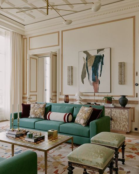 "The feeling that comes from a home as a place of identity, belonging and memories – is an essential part of why I became an interior designer." When the request for this duplex apartment in Paris – overlooking the Seine and the Louvre – came in, London designer Sophie Ashby (@studioashby) couldn't let the project go, even if there were some major challenges to overcome. To begin with, two apartments, one above the other, were to be merged into one. Their bones seemed promising: parquet floo... Green Sofa Living, Fireside Chairs, Socialite Family, Modular Lounges, Green Sofa, Wood Sofa, Green Chair, Modular Design, Wood Chair