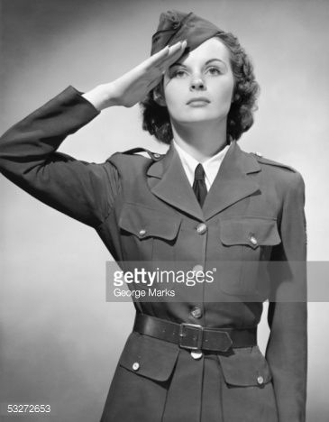 Woman in military uniform saluting 1950's Ww2 Fashion, Women's Military Uniform, Ww2 Women, Wwii Women, 1950s Woman, Wwii Posters, Ww2 Uniforms, Women's Uniforms, Marlene Dietrich