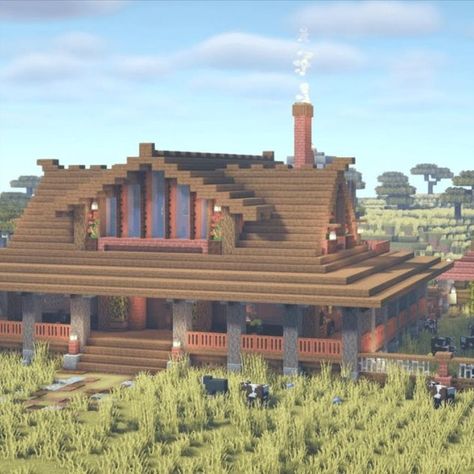 One of the most well-known ranch house ideas is this Country Style Ranch House. It displays a beautiful and large farmhouse in the countryside style that is completely furnished with a built-in animal pen and other farming-related conveniences. Ranch Style Minecraft House, Minecraft Country House Ideas, Minecraft Pig Pen Design, Country Minecraft House, Minecraft Cattle Ranch, Minecraft Horse Ranch Ideas, Minecraft Ranch House Ideas, Western House Minecraft, Ranch House Minecraft