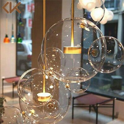 1 Light Canopy Width: 4.72in (12cm).   Theoretically, the working hour of this LED pendant light is 30000 hours. Bulb Type: LED. Assembly is required. 1 Light 4 Globes Width: 17.13in (43.5cm). 1 Light 6 Globes Width: 18.11in (46cm). Glass Ball Pendant Lighting, Room Hanging Lights, Ball Pendant Lighting, Verre Design, Bubble Chandelier, White Lamp Shade, Metal Pendant Light, Soap Bubbles, Ceiling Chandelier