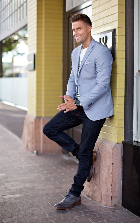 Dark wash denim, grey wingtip oxfords, blue blazer, nautical stripe tee, and a pocket square. Casual Men's Light Blue Blazer Outfit Men, Light Blue Blazer Outfit, Blue Jacket Outfits Men, Blue Blazer Outfit Men, Suit Jacket With Jeans, Blue Blazer Outfit, Light Blue Blazer, Stylish Street Style, Mens Business Casual