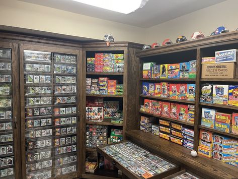 Pokemon Collection Display Ideas, Sports Card Shop Interior, Sport Card Display Ideas, Trading Card Display Ideas, Baseball Card Storage Ideas, Baseball Card Display Ideas, Sports Memorabilia Display Wall, Baseball Display Ideas, Card Collection Display