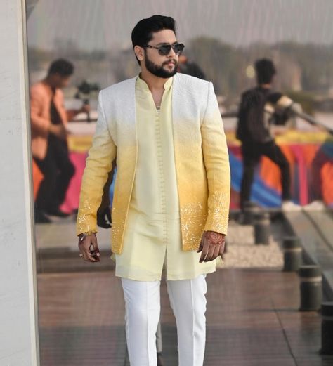 For the Haldi occasion, a men’s yellow Ombre jacket with kurta and bottom. This outfit blends traditional elements with modern aesthetics, perfect for the joyful and colourful Haldi ceremony. Groom @shivharesanyog Male Haldi Outfits, Yellow Haldi Outfit For Groom, Haldi Kurta For Groom, Haldi Ceremony Outfit For Groom, Haldi Ceremony Groom, Haldi Kurta For Men, Haldi Outfit For Men, Haldi Ceremony Outfit For Men, Western Outfit Men