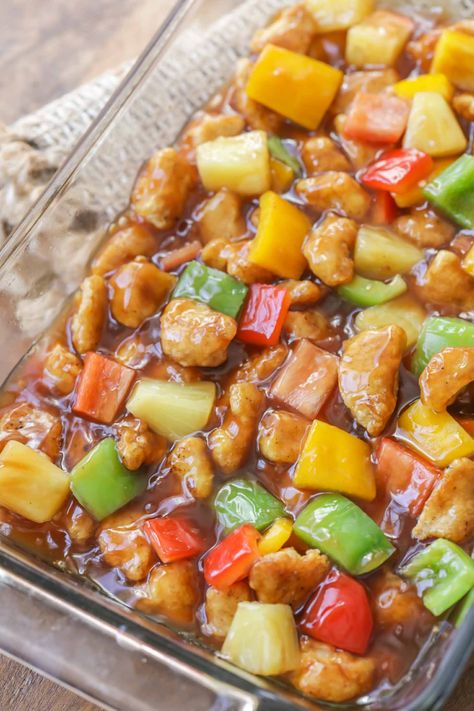 Baked Sweet and Sour Chicken is one of our family's favorite Asian recipes! There is so much flavor with the sauce, pineapples and peppers. Just with rice or noodles to complete this flavorful dish! Baked Sweet And Sour Chicken Recipe, Baked Sweet And Sour Chicken, Sweet And Sour Chicken Recipe, Sour Chicken Recipe, Sweet And Sour Meatballs, Sweet And Sour Chicken, Sweet Sour Chicken, Sweet N Sour Chicken, Chinese Cooking