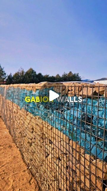 ZebraScapes Landscaping on Instagram: "GLASS GABION WALLS | COOL GABION WALL DESIGN | #gabionwalls #glasswalls #landscapingdesign #sedona #pheonix #prescott #prescottvalley @azluxuryhomegroup @luxurylivinghomesaz @luxuryprescott" Gabion Wall Architecture, Gabion Wall Design, Gabion Walls, Gabion Stone, Gabion Retaining Wall, Gabion Fence, Water Feature Wall, Gabion Wall, Bathroom Design Layout