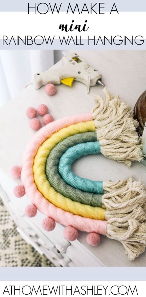 mini macrame rainbow wall hanging. Using cotton rope wrapped in yarn, here's a diy tutorial with step by step easy instructions. How to make a small fiber colorful rainbow. It's decorative and SO cute for a nursery or a girl rooms or play room Rainbow Room Decor Diy, Yarn Rainbow Diy, Mini Macrame Rainbow, Macrame Rainbow Wall Hanging, Rainbow Ornaments, Rainbow Diy, Rainbow Macrame, Macrame Rainbow, Rainbow Wall Hanging