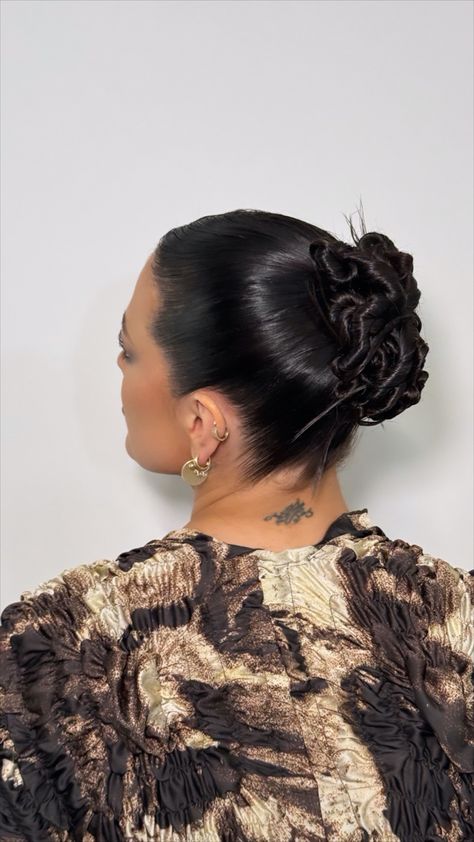 sleek hair, sleek bun, twisty bun, spiky bun, new york fashion week hairstyles, chignon, holiday hairstyles, party hairstyles, updo styles, updo for long hair, middle part bun, sleek middle part Middle Part Bun Sleek, Party Hairstyles Updo, Sleek Braided Bun, Slick Updo Hairstyles, Long Hair Middle Part, Middle Part Bun, Fashion Week Hairstyles, Sleek Middle Part, Twisty Bun