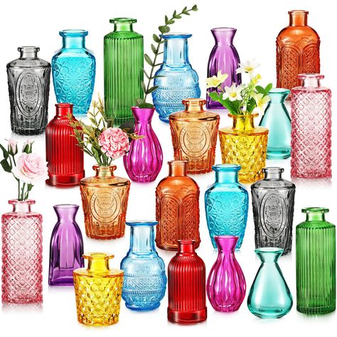 PRICES MAY VARY. Sufficient Glass Vases: this set comes with a whopping 24 pieces of colorful vases for centerpieces in 12 styles and various colors that are suitable for displaying your vibrant flowers and elegant bouquet; With such a large quantity, you can easily decorate your home, office, or event space with ease Stylish Rustic Touch: the colored glass vases are designed with various shape and colors, some of them are smooth, some are embossed, some are ribbed, etc., and the vintage colors August Wildflowers, Colorful Vases, Wildflower Wedding Theme, Colored Glass Vases, Table Centerpiece Decorations, Jewel Tone Wedding, Colored Vases, Glass Bottles Decoration, Wildflower Wedding