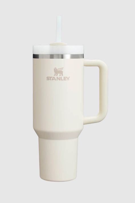 This Stanley Quencher H2.0 FlowState 40oz Travel Tumbler in Cream is just what you need for all-day hydration. Take it with you to a high-intensity workout or on an extra-long commute to keep your drink cold for hours. The lid features a rotating cover with three positions: a straw opening, a wide mouth for drinking, and a full-cover top to prevent spills. Features: Stanley Style: 10-10824-518 CREAM Color: Cream 90% Recycled 18/8 stainless steel, BPA-free Recycled stainless steel icon inside the tumbler indicates your Quencher is made from sustainable material Double-wall vacuum insulation Powder coat finish FlowState™ screw-on 3-position lid Reusable straw Comfort-grip handle Car cup holder compatible (base diameter: 3.1 inches) Dishwasher safe Dimensions: 3.86 L x 5.28 W x 12.3 H Tan Stanley Cup, Cream Stanley Cup, Stanley Cup Mini, Stanley Cup Tumbler, Cream Stanley, Stanley Colors, Stanley Cream, White Stanley, Cute Stanley