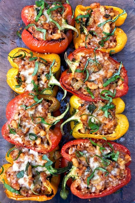 These vegetarian stuffed peppers are absolutely amazing, and just may become one of your favorite meals to make! Colorful bell peppers stuffed with zucchini, onion, garlic, farro, beans, tomato, spices, and melted cheese, it’s a meal that the whole family will love! #vegetarianmeals #vegetariandinners #healthymeals #healthydinners #stonesoupblog Veggie Stuffed Peppers, Family Vegetarian Meals, Bell Peppers Stuffed, Vegetarian Stuffed Peppers, Vegetarian Italian, Meals To Make, Meatless Mondays, Vegetarian Entrees, Tasty Vegetarian Recipes