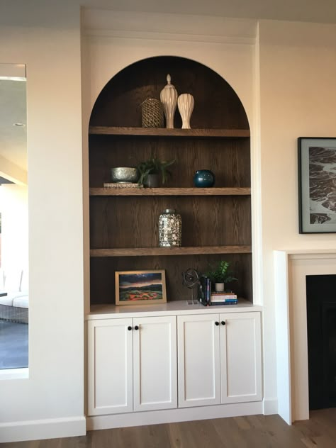 Matching Wall And Cabinet Color, Curved Shelves Built Ins, Built In Shelves Living Room Cathedral Ceiling, Inset Built Ins, Mushroom Built Ins, Arched Bookshelves Built Ins, Dark Wood Built In Bookshelves, Drywall Shelves Built Ins, Arched Shelving Built Ins